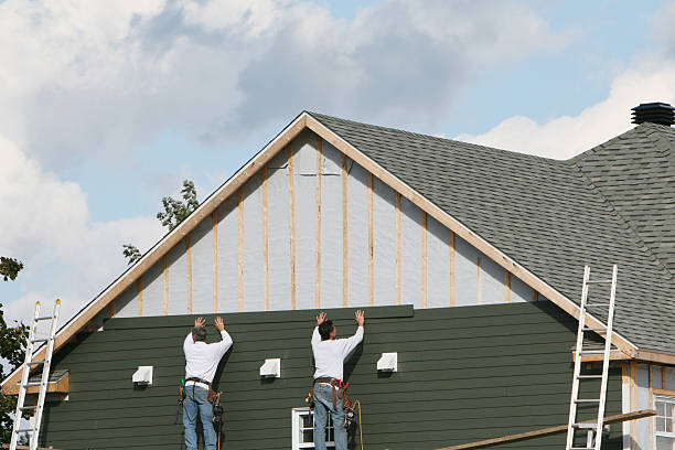 Professional Siding Installation technician working in Bremen, IN